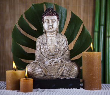 Buddha statue in a meditation clipart