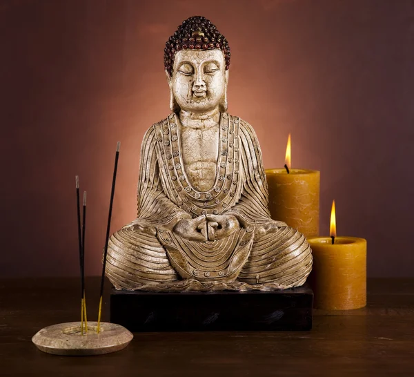 Boeddha met kaars — Stockfoto