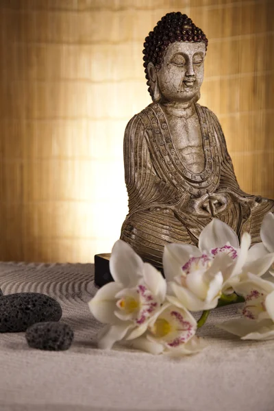 stock image Buddha statue with orchid flower