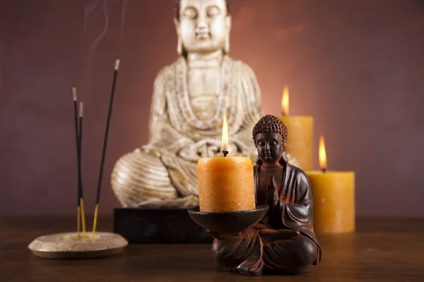 Buddha se svíčkou — Stock fotografie