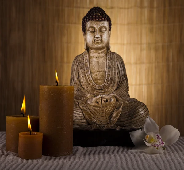 Buddha with candle — Stock Photo, Image