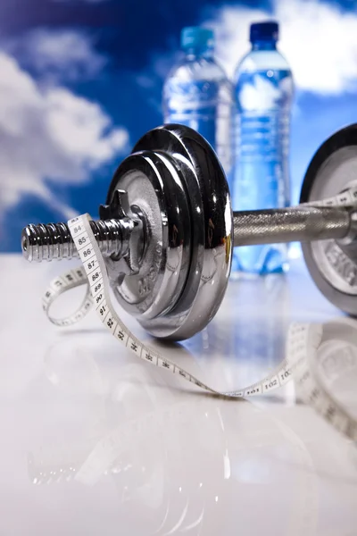 Fitness, dumbell and blue sky — Stock Photo, Image
