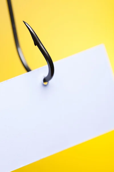 Blank on piece of paper on hook — Stock Photo, Image