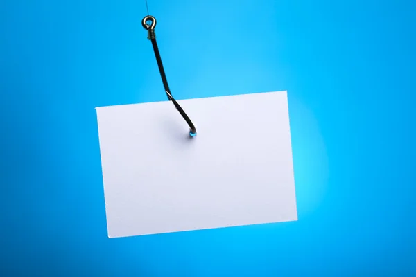 Blank on piece of paper on hook — Stock Photo, Image