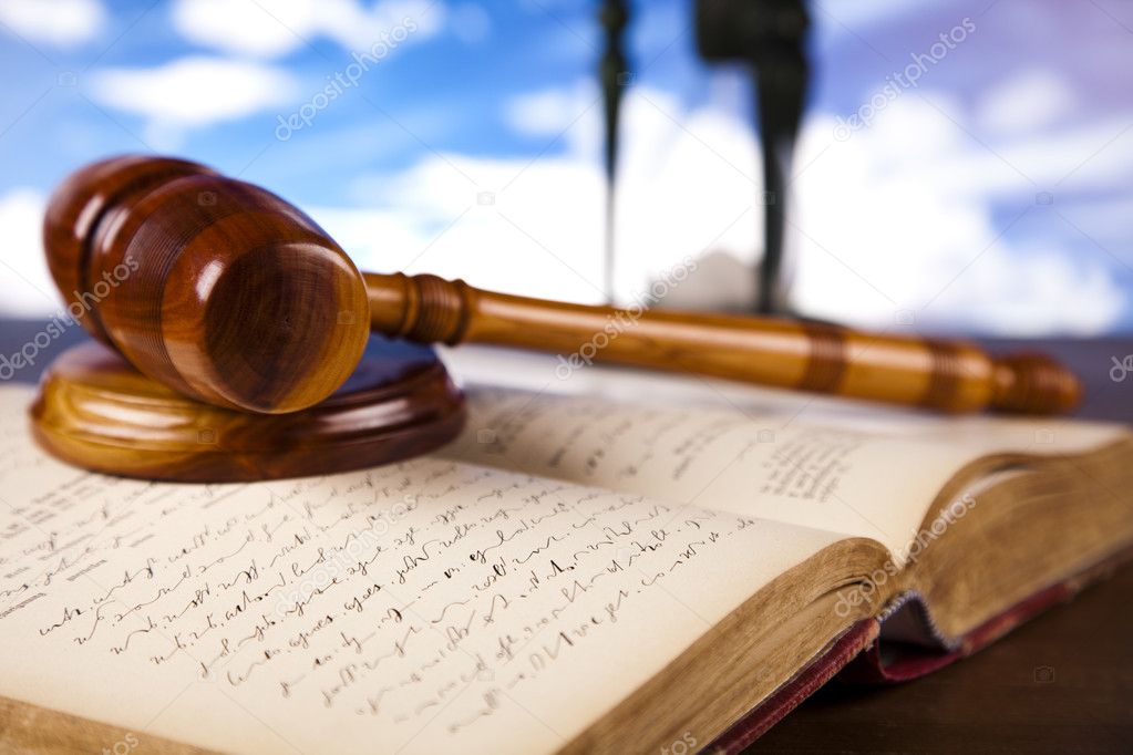 Judges wooden gavel in blue sky background