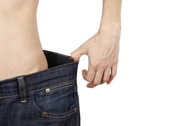 Donna magra in jeans grandi — Foto Stock
