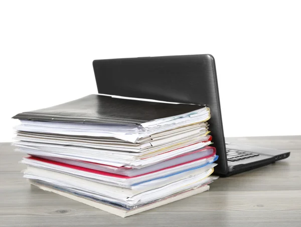Many files and a computer on a desk — Stock Photo, Image
