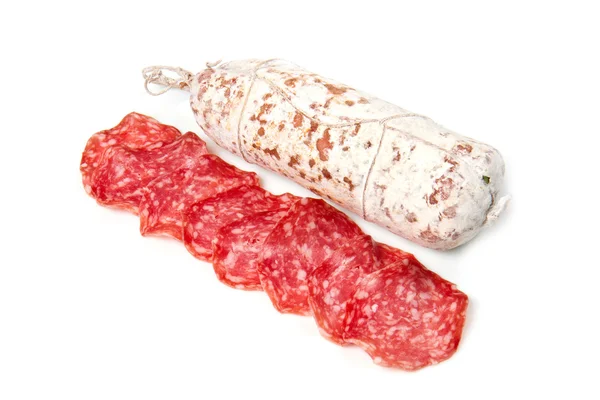 Salami sliced on the white — Stock Photo, Image