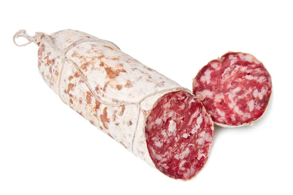 Salami gesneden op de witte — Stockfoto