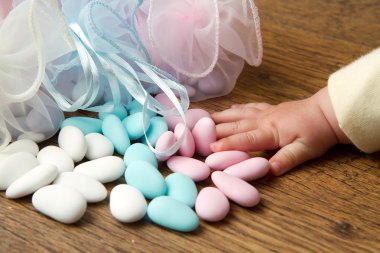 Candy favors with baby hand clipart