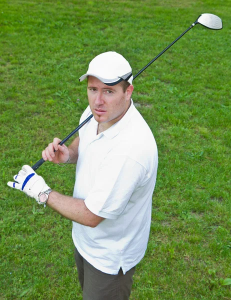 En bild av en ung manlig golf spelare — Stockfoto