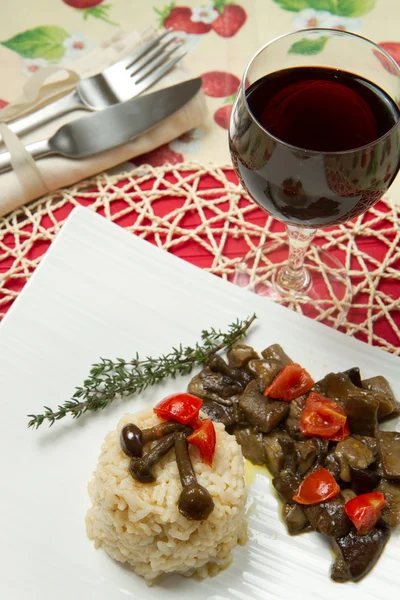 stock image Risotto with tomaotes and mushrooms