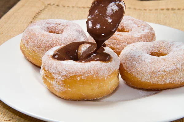 Donuts con chocolate —  Fotos de Stock