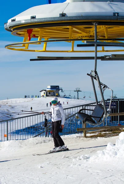 Skier near chair-lift — Stock Photo, Image