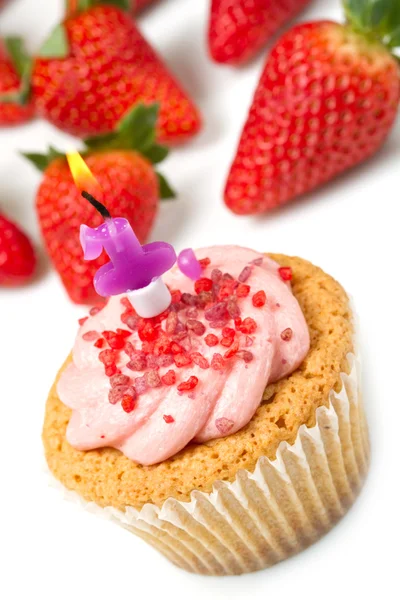 Strawberry cupcake with candle — Stock Photo, Image