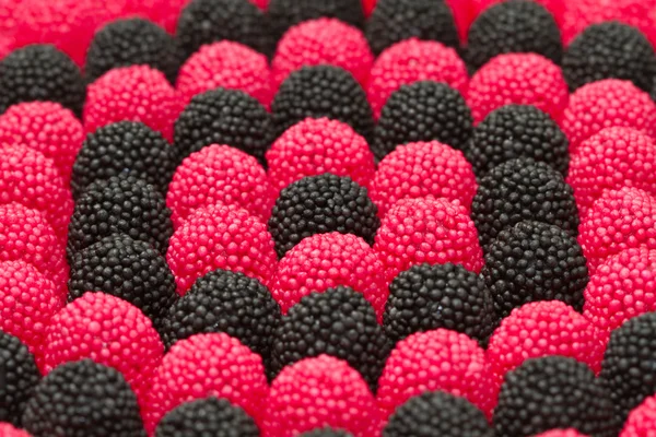 Rote und schwarze Brombeeren Bonbons — Stockfoto