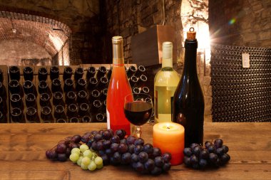 Glasses of wine in the cellar clipart