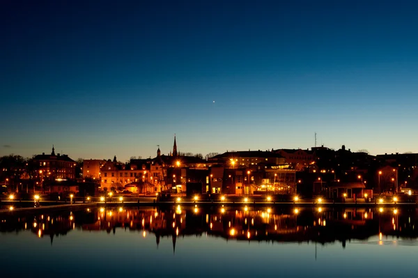 stock image The harbor and the town Oskarshamn in Sweden at night