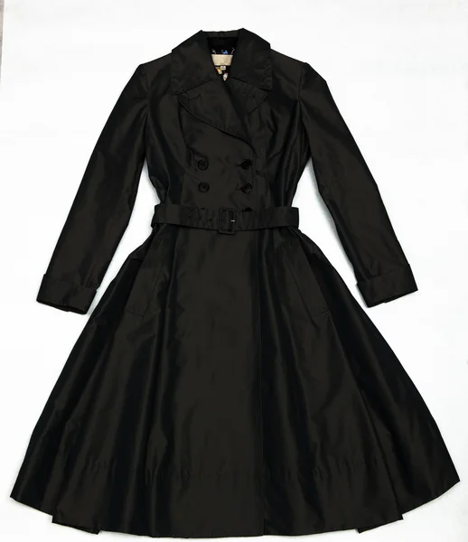 Чорне сяюче жіноче плаття з гудзиками — стокове фото