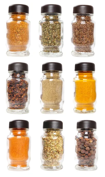 Bottles with seasonings — Stock Photo, Image