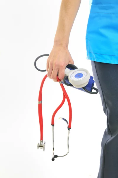 Arzt mit Stethoskop und Blutdruckmessgerät — Stockfoto