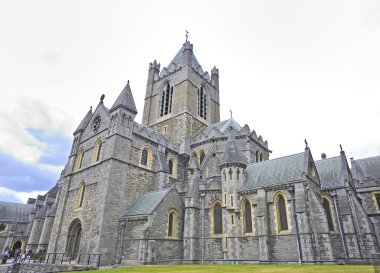 St. Patrick's Cathedral and green grass in Dublin, Ireland clipart