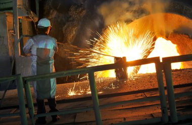 Molten hot steel pouring and worker clipart