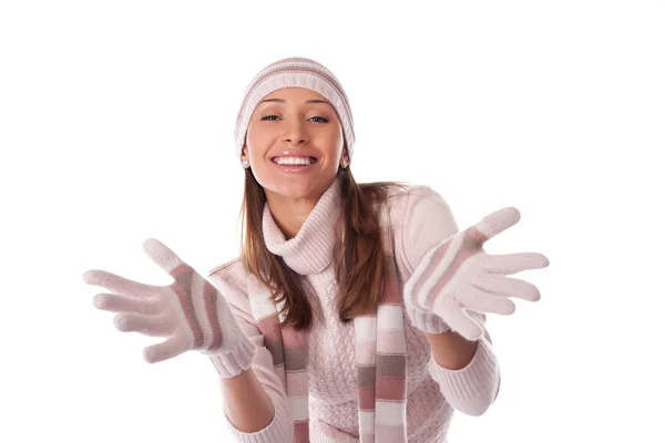 Happy young woman in winter clothes on a white — Stock Photo, Image