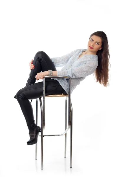Sitting on bar chair young woman — Stock Photo, Image