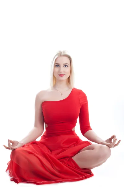 Femme en pose de yoga sur un blanc — Photo