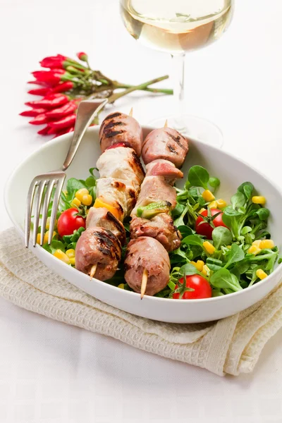 Meat Skewers on white table — Stock Photo, Image