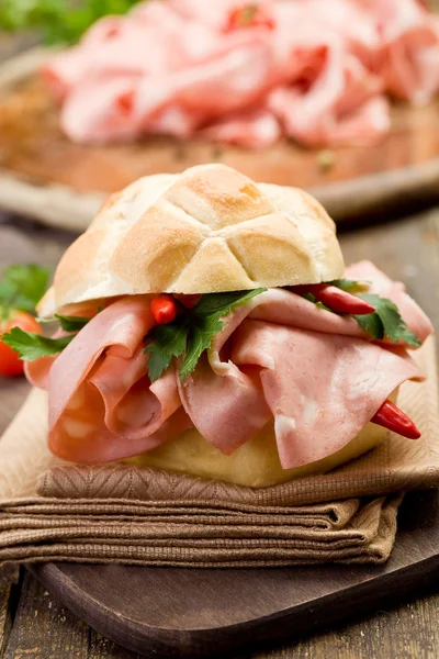 Sandwich with Mortadella and red peppers — Stock Photo, Image