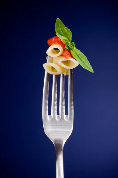 Fork with pasta and tomato sauce — Stock Photo, Image