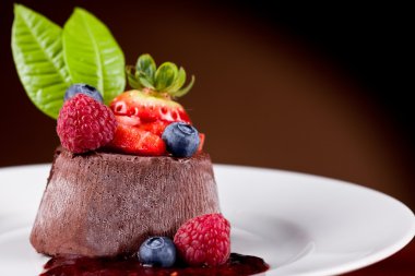 Chocolate Panna cotta with berries clipart