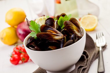 Mussels with white wine clipart