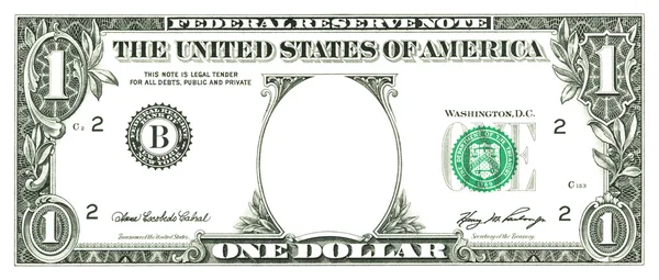 Uma nota de um dólar com um buraco — Fotografia de Stock