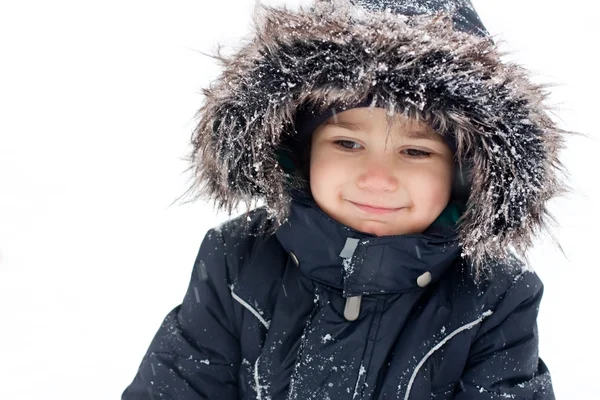 Vrolijke jongen in snowsuit — Stockfoto