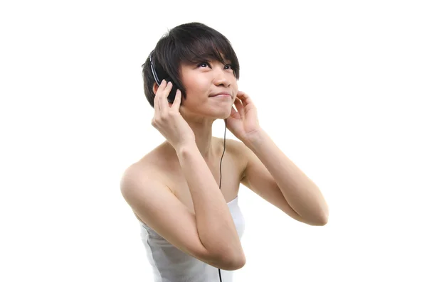 Asiatische Mädchen hören mp3 lizenzfreie Stockbilder