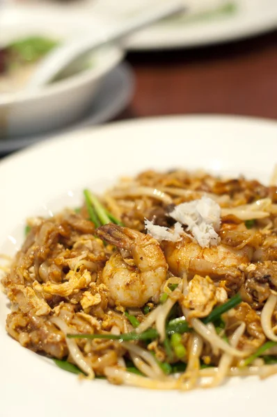 Fried Penang Char Kuey Teow which is a popular noodle dish in Ma — Stock Photo, Image
