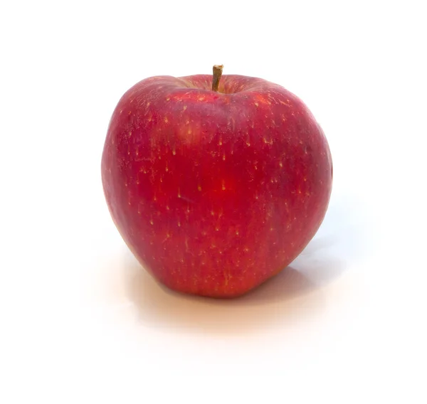 Een sappige appel op een witte achtergrond — Stockfoto