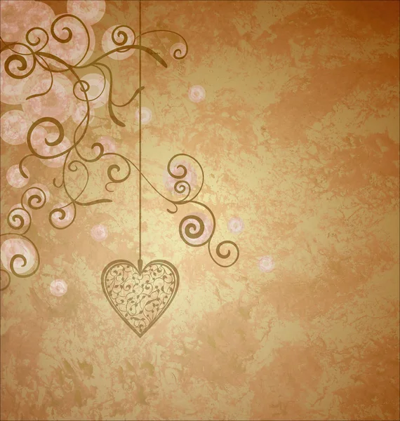 Golden heart with flourishes hanging on grunge old paper backgro — Stock Photo, Image