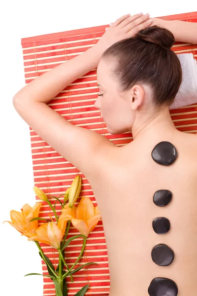 Mulher com pedras de massagem Imagens De Bancos De Imagens