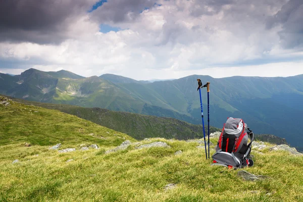 stock image Hiking pole and backpack in mountain