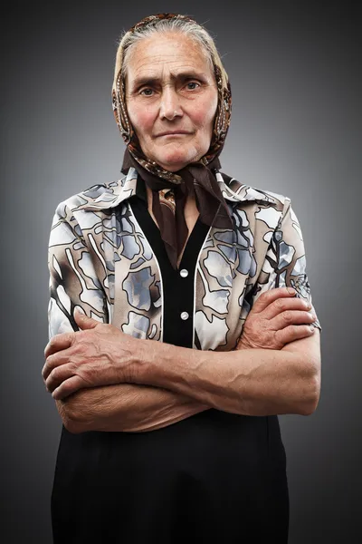 Elderly woman with kerchief — Stock Photo, Image