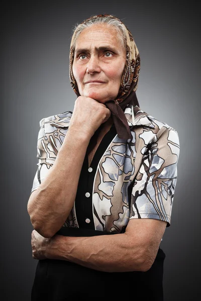 Elderly woman with kerchief — Stock Photo, Image