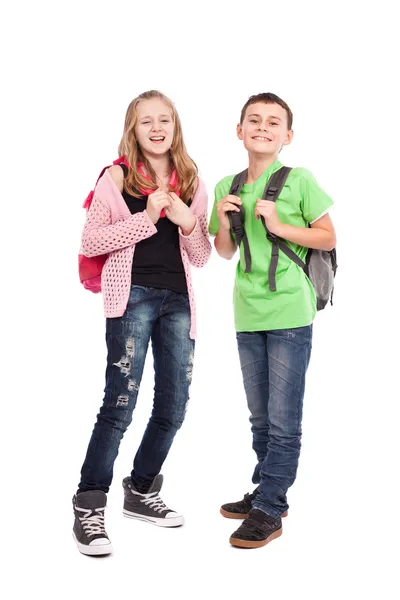 Skolbarn med ryggsäckar — Stockfoto