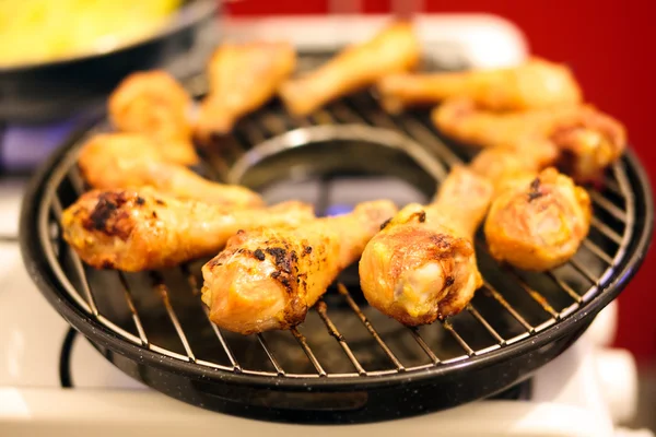 Drumsticks grill on gas stove — Stock Photo, Image
