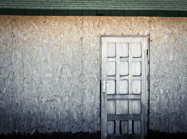 木製の壁のドア — ストック写真