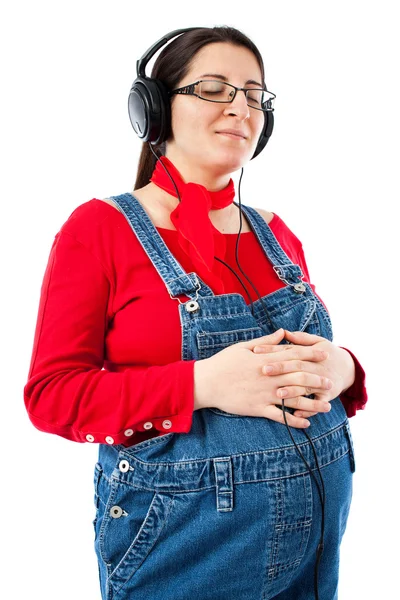 Έγκυος γυναίκα με ακουστικά — Φωτογραφία Αρχείου