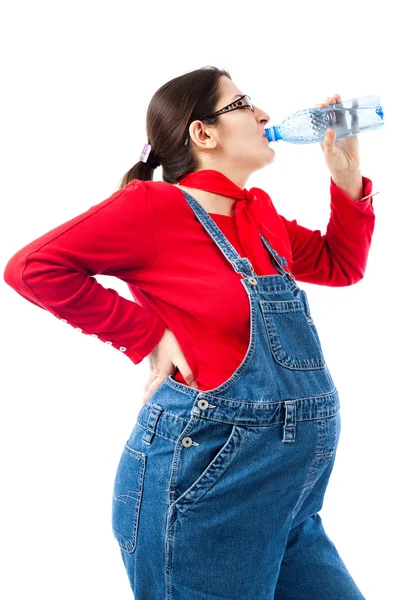 Schwangere mit Wasserflasche Stockfoto